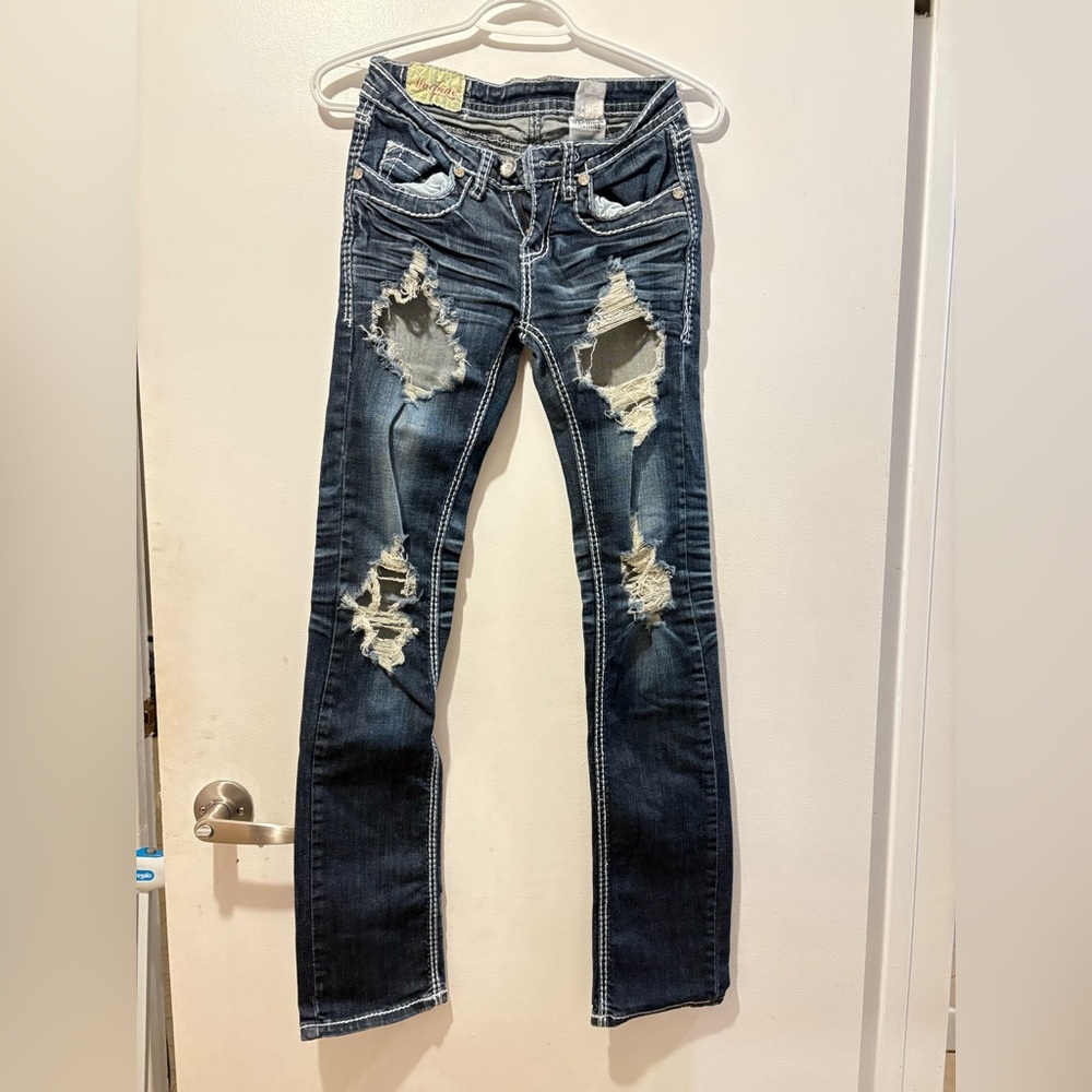 Machine Distressed Blue Jeans